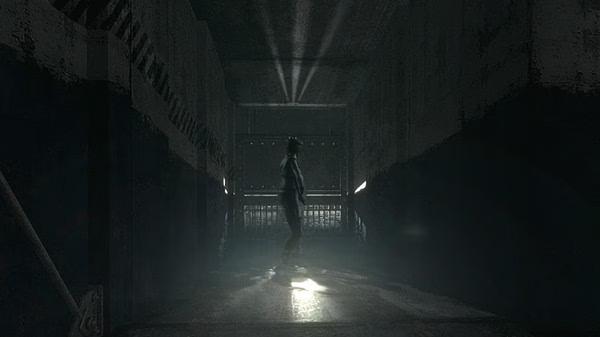 Resident Evil HD Remaster screenshot: A character stands in a dimly lit hallway with beams of light shining through a metal grate.