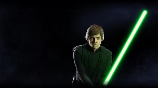 A STAR WARS Battlefront II screenshot showing a character holding a glowing green lightsaber against a dark background.