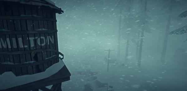 A screenshot from The Long Dark showing a snowy scene with a Milton water tower, trees, and power lines fading into the blizzard.
