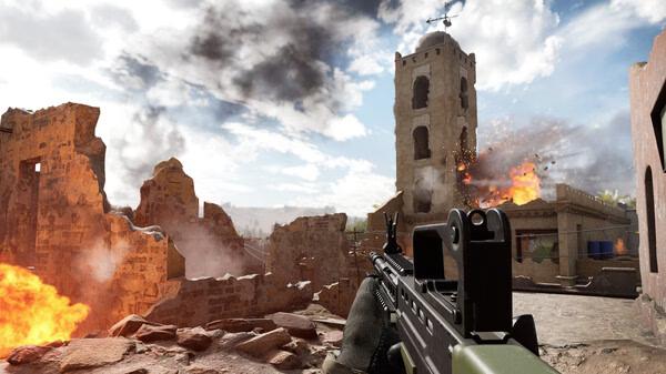 Insurgency: Sandstorm screenshot showing a player holding a rifle in a war-torn area with explosions and smoke in the background.