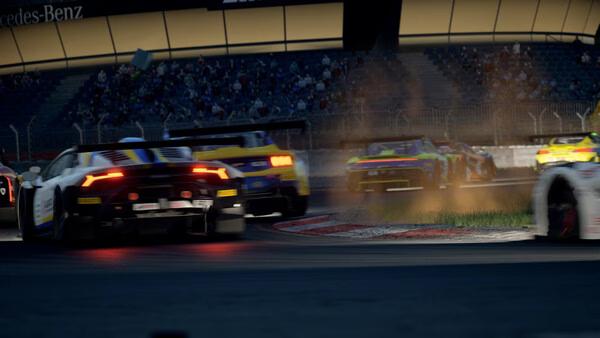 A screenshot from Assetto Corsa Competizione shows race cars drifting through a corner on a lit track, with dust kicking up in the action.