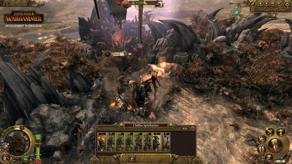 Total War: WARHAMMER screenshot showing an army led by Chubb Spittlucker approaching an enemy fort in a desolate landscape.