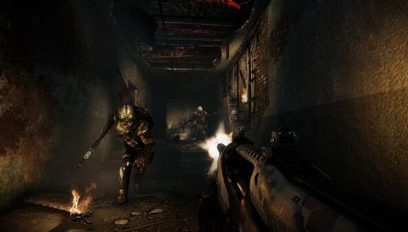 Crysis 3 Remastered screenshot: A player aims a rifle at armored enemies in a dimly lit, narrow corridor with flames and debris scattered.