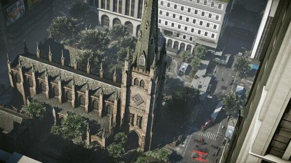 A screenshot from Crysis 2 Remastered showing a detailed church surrounded by urban buildings and streets in a city environment.