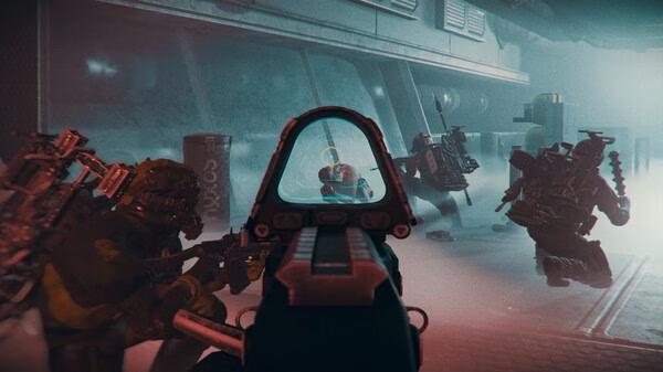GTFO screenshot: Players in heavy gear aiming weapons inside a dimly lit, foggy industrial environment with visible machinery and graffiti.