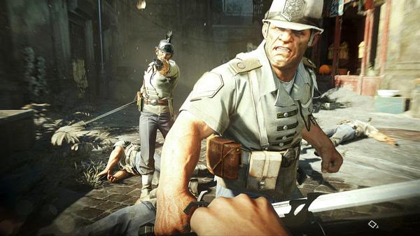 Screenshot from Dishonored 2 showing a first-person view of a character facing armed guards in a sunlit alley.