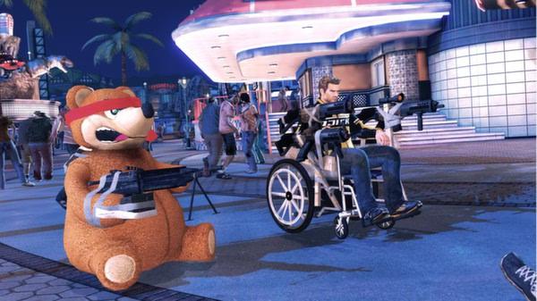 Dead Rising 2 screenshot: A man in a wheelchair and a teddy bear with weapons are in a lively outdoor plaza. People are seen in the background.