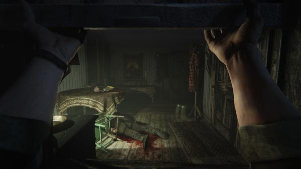 Outlast 2 screenshot: A character peers into a dimly lit room showing a lifeless body on the floor and eerie surroundings.