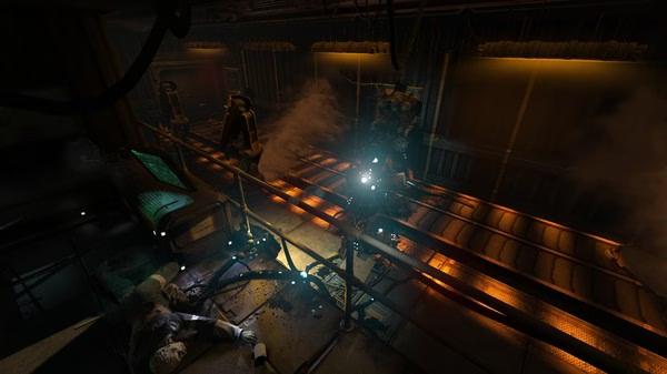 SOMA screenshot: A dimly lit industrial hallway with robotic figures and glowing lights, featuring steam and a fallen humanoid figure.
