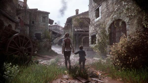 Screenshot from A Plague Tale: Innocence showing two characters walking through an ancient village with stone buildings and overgrown grass.