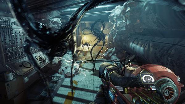 Screenshot from Prey showing a player holding a weapon inside a spaceship corridor, facing ominous alien creatures.