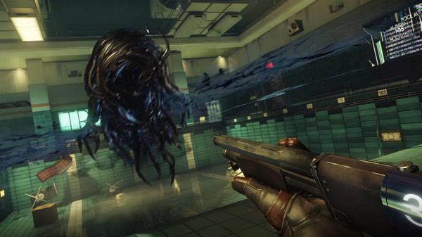 A screenshot from Prey showing a player aiming a shotgun at a floating black alien creature in a brightly lit room.