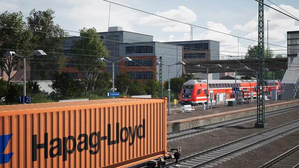 Screenshot from Train Sim World 6 shows a bustling train station with a passenger train and Hapag-Lloyd cargo container.