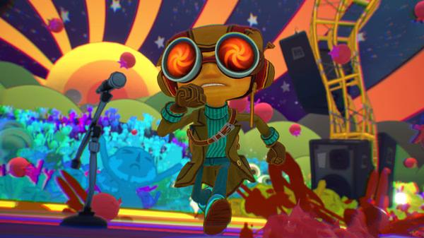A screenshot from Psychonauts 2 showing Raz on stage, wearing goggles, in a vibrant, colorful psychedelic setting.