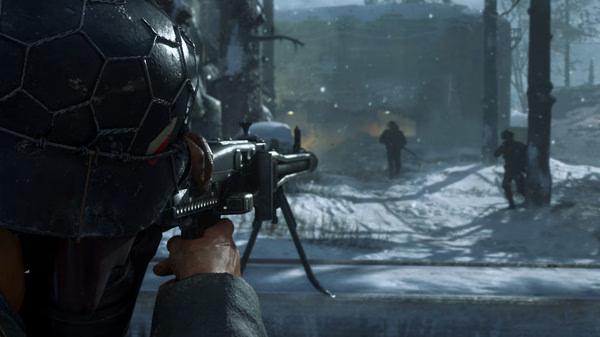 A Call of Duty: WWII screenshot showing a soldier aiming a machine gun in a snowy forest as enemies advance.