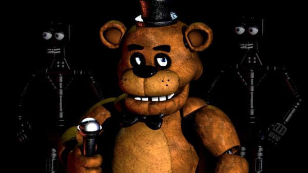 Screenshot from Five Nights at Freddy's showing Freddy Fazbear holding a microphone, flanked by two endoskeletons in a dark setting.