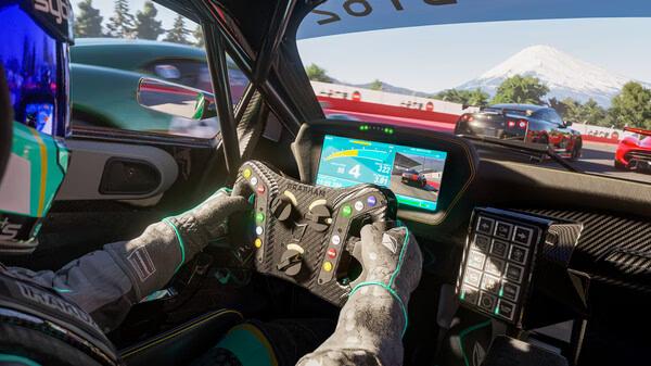 Forza Motorsport screenshot: A driver in a racing suit grips a steering wheel with cars on a track and a mountain visible through the windshield.