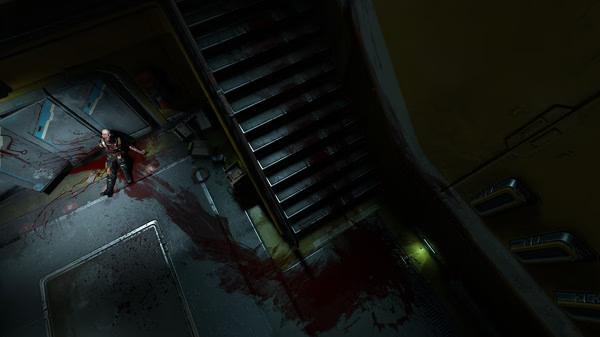 DOOM screenshot: A blood-splattered scene with a lone figure near stairs in a dimly lit industrial corridor.