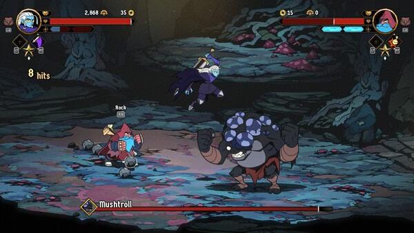 Absolum screenshot: A character battles two enemies, Rock and Mushtroll, in a colorful, rocky underground arena.