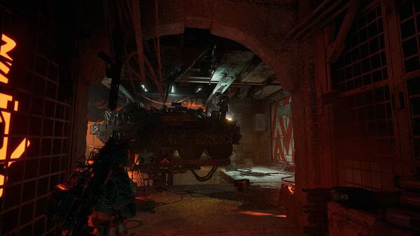 A screenshot from The Forever Winter showing a dimly lit underground garage with a soldier and an armored vehicle.