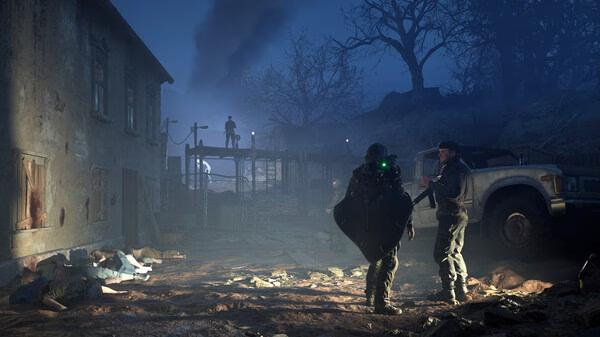 A Hell is Us screenshot showing two characters facing off near an abandoned house, with a figure on a platform in the background.