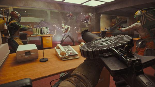 Screenshot from FBC: Firebreak showing a player aiming a weapon at an enemy in an office setting with chaos unfolding.
