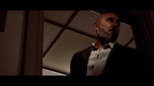 A screenshot from SILENT HILL: Townfall showing a bearded man in a suit standing in a dimly lit doorway, looking to the side.