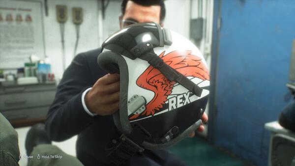 A screenshot from "ACE COMBAT 8: WINGS OF THEVE" showing a person holding a helmet with a red winged design and the word "REX."
