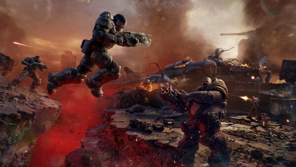 Screenshot from Gears of War: E-Day showing an intense battle scene with soldiers fighting amidst a fiery, war-torn landscape.