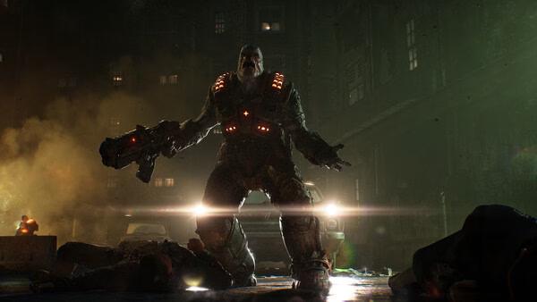 Screenshot from Gears of War: E-Day showing a heavily armed Locust enemy standing amidst debris in a dark, war-torn city.