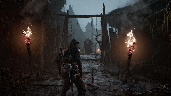 A screenshot from Mortal Shell II shows a warrior facing a gate guarded by a towering figure, amidst a dark, rain-soaked environment.