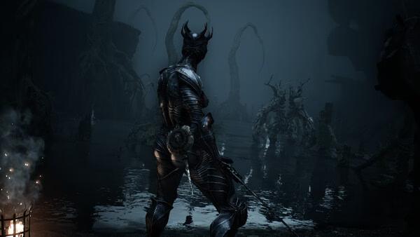 A screenshot from Mortal Shell II showing a heavily armored character facing a grotesque, tree-like enemy in a dark swamp.