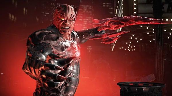 Injustice™ 2 screenshot showing the red-skinned character Atrocitus lunging forward with a spiked arm.