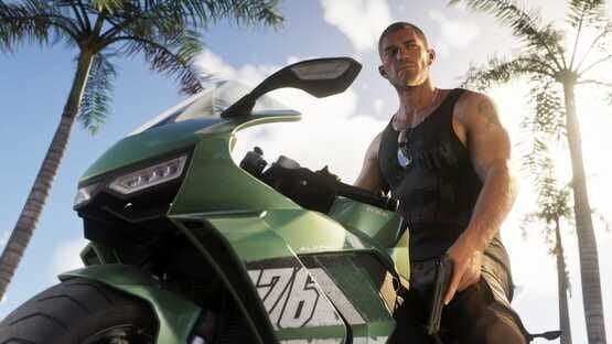 A screenshot from Grand Theft Auto VI (PlayStation 5) shows a man standing beside a green motorcycle under palm trees.