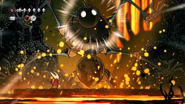 Screenshot from Hollow Knight: Silksong showing Hornet facing a large, glowing, spider-like boss in a fiery, cavernous environment.