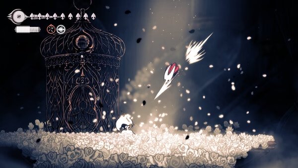 Hollow Knight: Silksong screenshot showing Hornet leaping near a large ornate cage surrounded by a field of flowers.