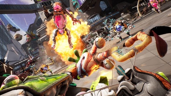 A 'High On Life 2' screenshot showing an alien battle scene with colorful creatures and explosions in a futuristic city.
