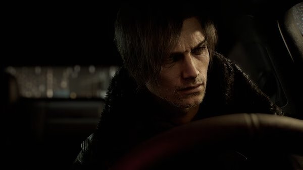 Screenshot from Resident Evil Requiem showing a character with a blurred face seated inside a dimly lit car interior.