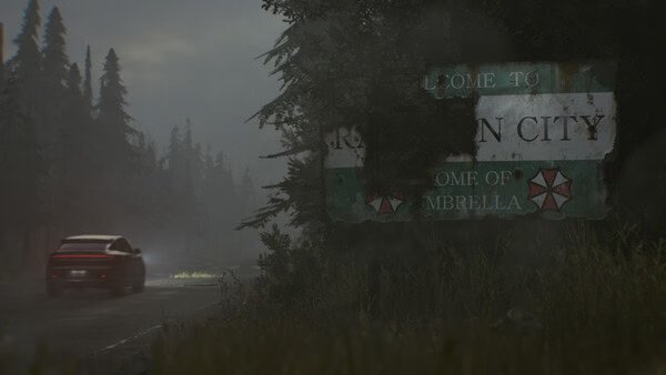 A screenshot from Resident Evil Requiem shows a foggy road with a damaged Raccoon City sign and a car driving into the mist.