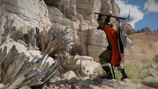Screenshot from Crimson Desert showing a character mining crystal formations on a rocky cliff under a clear blue sky.