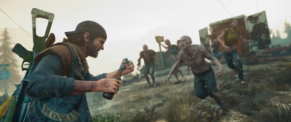 A Days Gone screenshot showing the protagonist preparing to throw a Molotov at approaching zombies in a grassy, rural area.