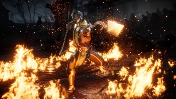 Screenshot from Mortal Kombat 11 showing a character in yellow armor wielding a chained weapon amid fiery surroundings.