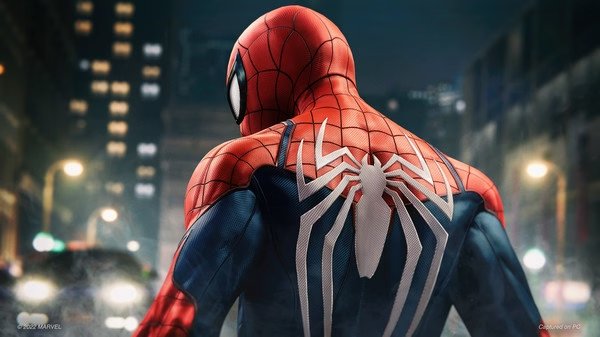 Screenshot from Marvel's Spider-Man Remastered showing Spider-Man from behind in his iconic suit, overlooking a city street.