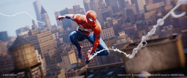 Screenshot from Marvel's Spider-Man Remastered shows Spider-Man swinging above a detailed cityscape.