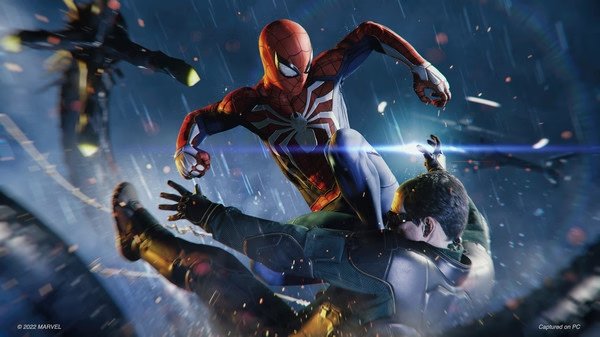 Spider-Man attacks an enemy mid-air in Marvel's Spider-Man Remastered. Dynamic action fills the screenshot with vibrant effects.