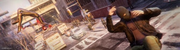 Screenshot from Marvel's Spider-Man: Miles Morales showing Miles web-swinging while disarming an enemy on a snowy city street.