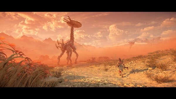 Screenshot from Horizon Forbidden West™ Complete Edition showing a player character approaching a Tallneck in a vast, orange-hued landscape.