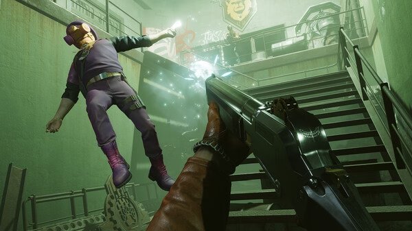 Deathloop screenshot: A player aims a gun at an enemy mid-air in a green-lit stairwell with graffiti and stairs in the background.