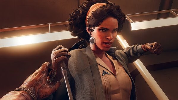 A tense moment in Deathloop screenshot: a character holds a knife to a woman with curly hair and a headband inside a modern building.