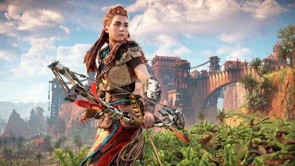 Screenshot from Horizon Zero Dawn™ Remastered showing a character with a bow in front of a lush landscape and a large bridge.
